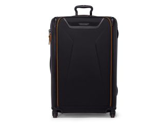 This packing case echoes automotive inspiration inside and out with its CX6 carbon fiber accents and compression straps reminiscent of McLaren's 5-point harness. Its expandable and spacious design is ideal for longer trips or group packing.