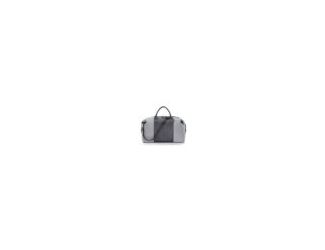 Crafted from matte-finish vegan leather, this sleek bag offers style and versatility. Use the side snaps for a rounded silhouette or leave them open for a more structured, square look. The roomy main compartment includes a side pocket for easy organizatio