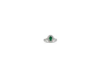 Make a royal statement with this striking ring that features a passionately green 6x4mm oval emerald surrounded by a halo of .20twt round brilliant-cut diamonds set in 14k yellow gold. Available in whole sizes 6-9.