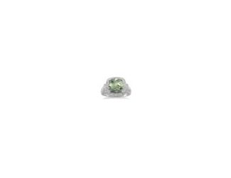 Crafted in luminous sterling silver, this bold and beautiful ring features a centrally staged cushion-cut green amethyst gracefully complemented by 18 sparkling single cut diamonds in pav setting. Total diamond weight is 1/20 ctw, and the green amethyst m