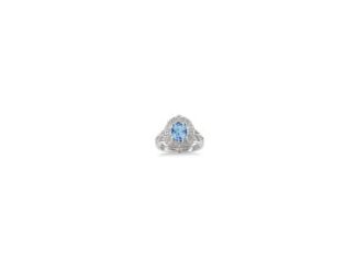 This charming, intricately carved blue topaz and diamond ring makes an elegant addition to any woman's jewelry collection. Intricately carved and beautifully decorated with .02twt round diamonds set in sterling silver. The center 9x7mm oval-cut blue topaz