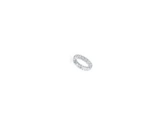 Elegant Rhodium Plated Cubic Zirconia Band Ring. This ring features minimalistic band design made out of large clear oval cubic zirconia set in shared prong setting. Crafted with Rhodium Plating and it is available in sizes 6, 7 or 8. Perfect piece of jew