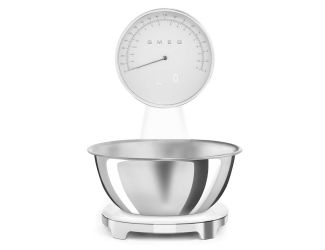 The Smeg dual-mode scale, analog and digital, is the first step in tackling any kitchen challenge. Compact and versatile, it combines the pleasure of design with a passion for cooking. 
Removable stainless steel bowl, maximum capacity 5 kg. 
Easy conversi