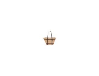 Easy style in a  fanbbshaped silhouette, the Key West Tote is your new go to for beach days or city streets. Soft woven straw with leather trim keeps it relaxed yet polished, while dual straps and a toggle closure make carrying effortless. Roomy enough fo
