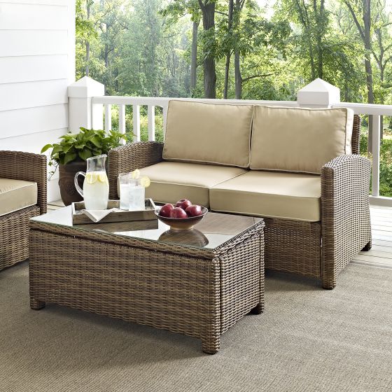 Bradenton 2 Piece Outdoor Wicker Seating Set with Sand Cushions - Loveseat & Glass Top Table