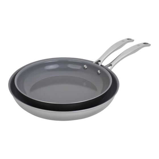 High-performance nonstick fry pan set for large-batch cooking. Sturdy tri-ply clad construction with aluminum core heats up evenly and quickly. Toxic-free Ceraforce ceramic nonstick coating offers quick and easy release. Comfortable stay-cool hollow cast 
