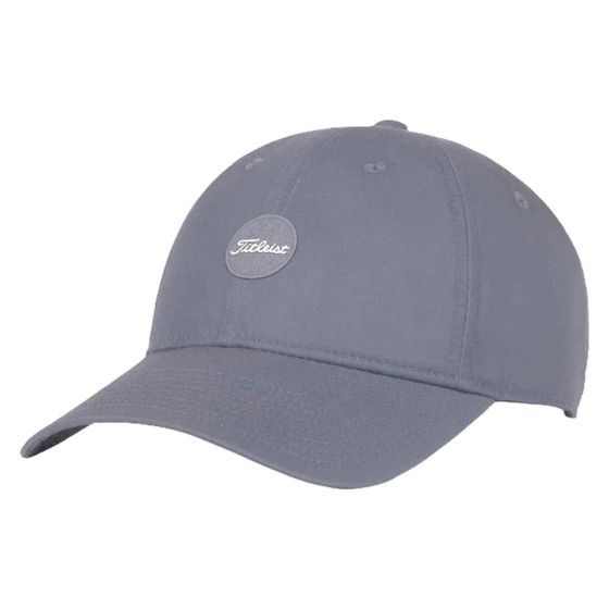 The Titleist Montauk Lightweight Golf Hat pairs classic style with breathable comfort for everyday play. Made from 100% polyester faux cotton, it features an unstructured front panel, clean relaxed silhouette, and a standard curve bill for a traditional l