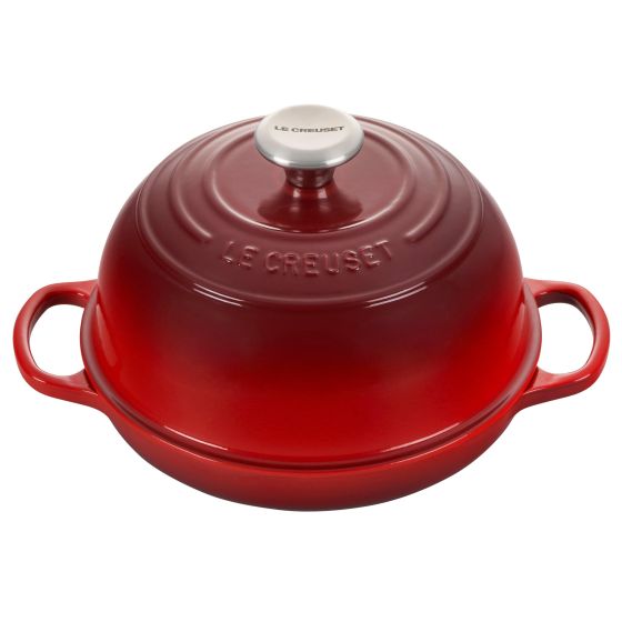 Cast iron provides exceptional heat distribution and retention. Low profile base with raised ridges supports even browning. Enamel finish minimizes sticking resists dulling staining chipping and cracking. Domed lid is designed to trap and circulate steam 