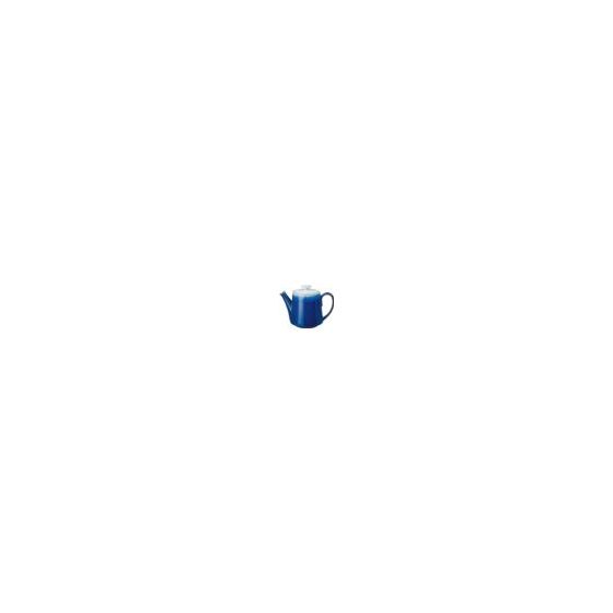 Delight the tea lover in you with the elegant Denby Blue Haze Teapot. The high-quality stoneware is expertly glazed to prevent chipping. It features a curvy and chic handle that adds to its elegance. With a contemporary design and attractive blue shade, t