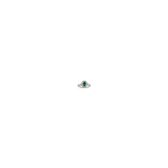 Make a royal statement with this striking ring that features a passionately green 6x4mm oval emerald surrounded by a halo of .20twt round brilliant-cut diamonds set in 14k yellow gold. Available in whole sizes 6-9.