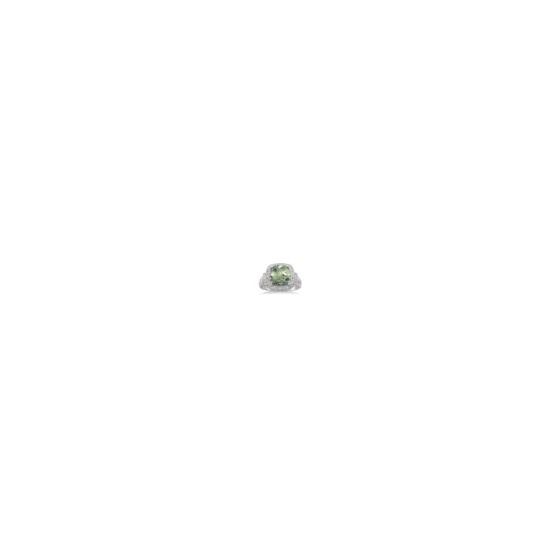 Crafted in luminous sterling silver, this bold and beautiful ring features a centrally staged cushion-cut green amethyst gracefully complemented by 18 sparkling single cut diamonds in pav setting. Total diamond weight is 1/20 ctw, and the green amethyst m