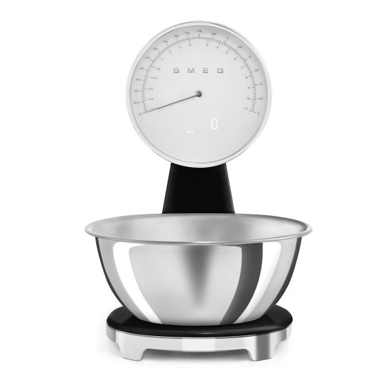 The Smeg dual-mode scale, analog and digital, is the first step in tackling any kitchen challenge. Compact and versatile, it combines the pleasure of design with a passion for cooking. 
Removable stainless steel bowl, maximum capacity 5 kg. 
Easy conversi